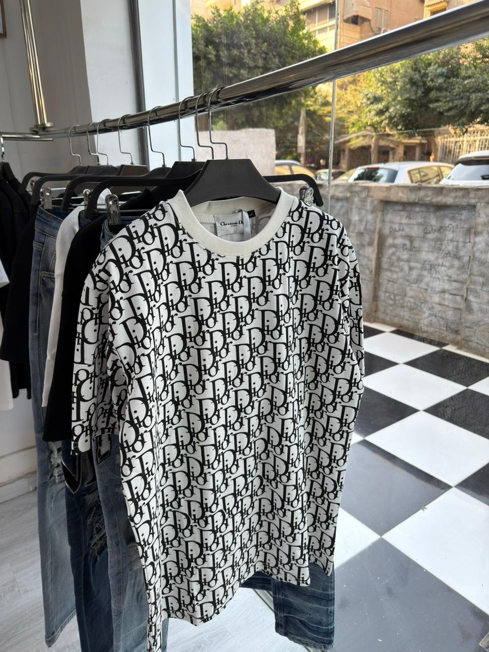 WhatsApp Image 2026-03-05 at 8.13.11 PM T-SHIRT DIOR FULL CAVER WHITE - Image 1